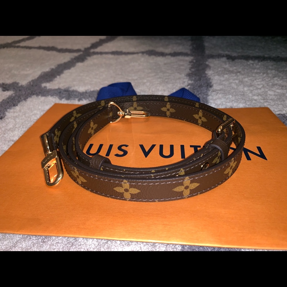 Louis Vuitton adjustable monogram shoulder strap.